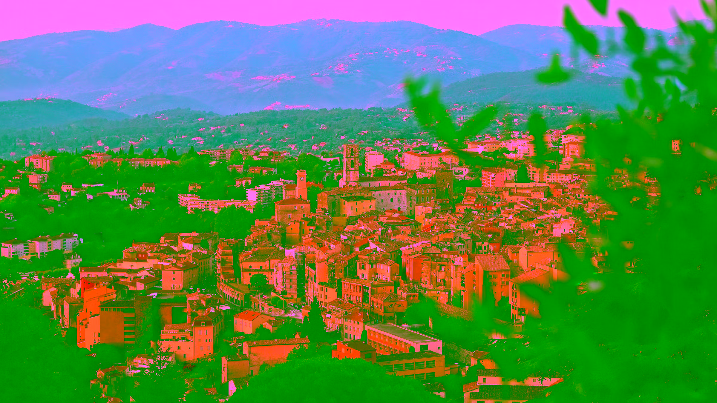 Grasse old town at golden hour, the perfume capital of the world seen from the surrounding hills — shore excursion from Cannes